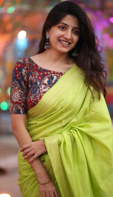 Actress Poonam Kaur Stills In Transparent Green Saree 5